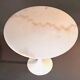 Tulip pedestal table in veined white marble and cast aluminum base, 1970/1980