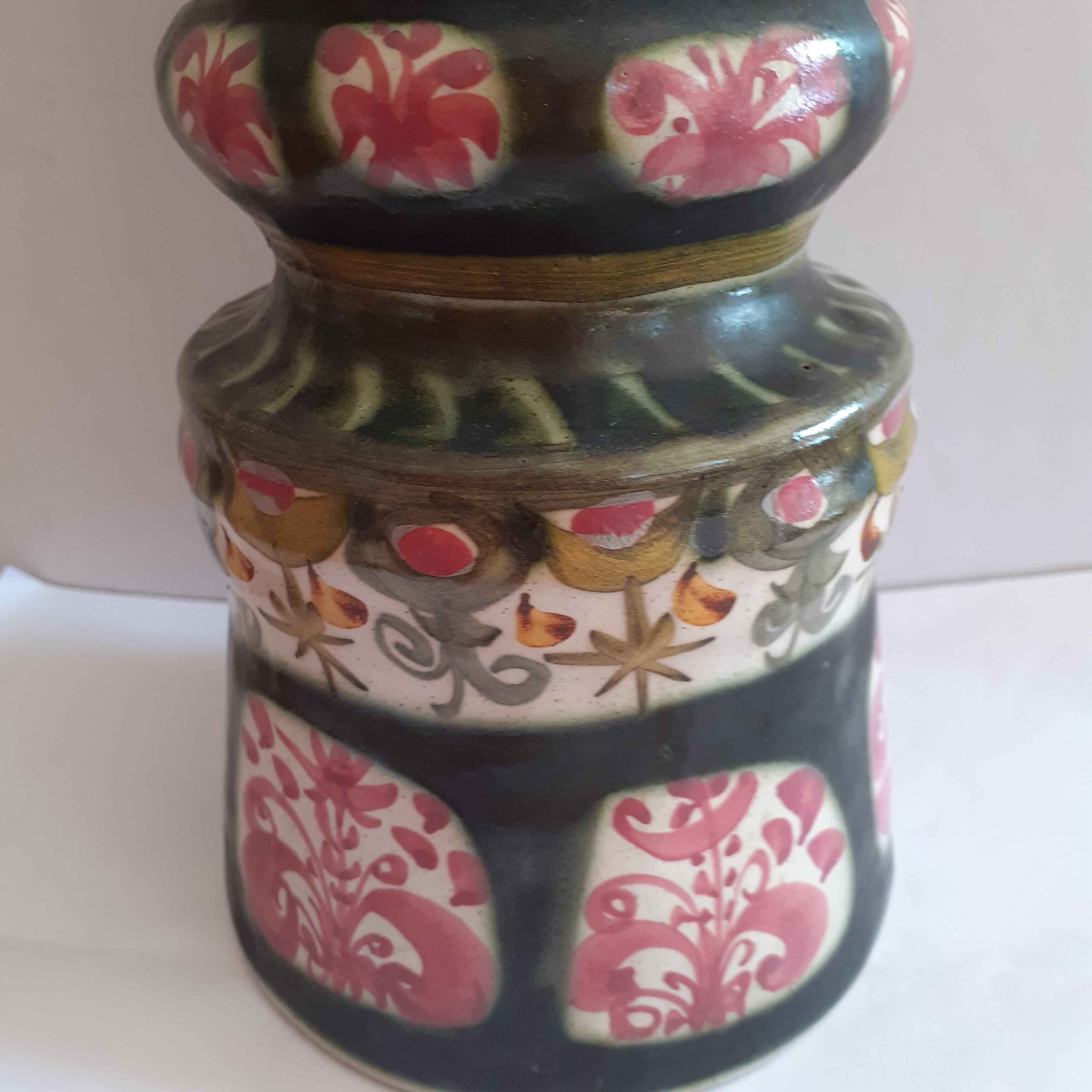 Candlestick, signed André L' Helgen. Mr. Keraluc. Quimper.Painted hand.