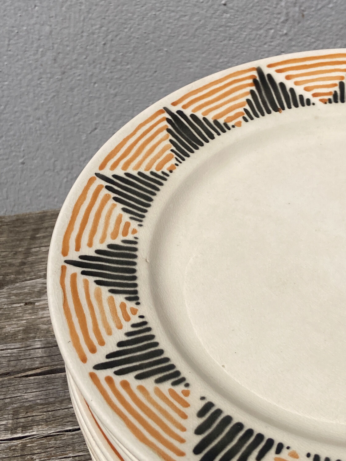 12 flat plates in yellow earthenware Badonviller