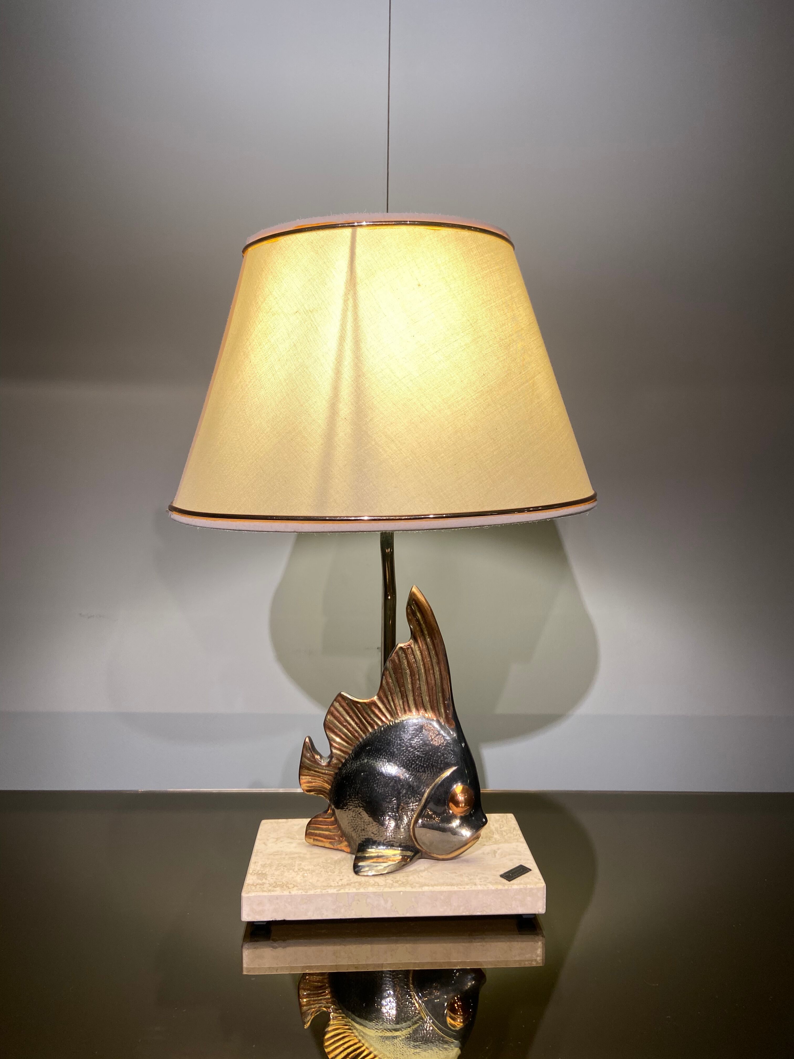 Vintage fish lamp in gold and copper metal