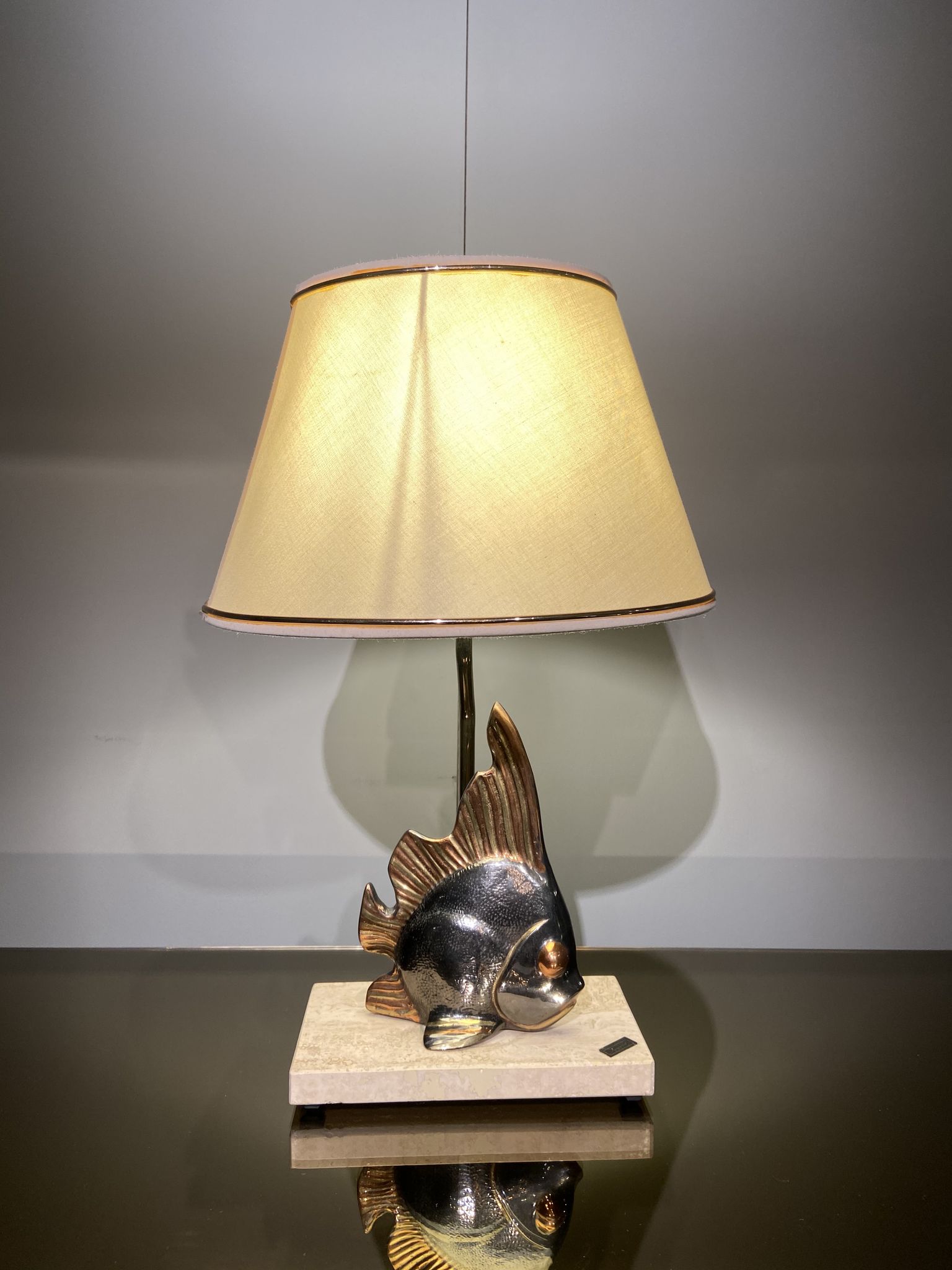 Vintage fish lamp in gold and copper metal