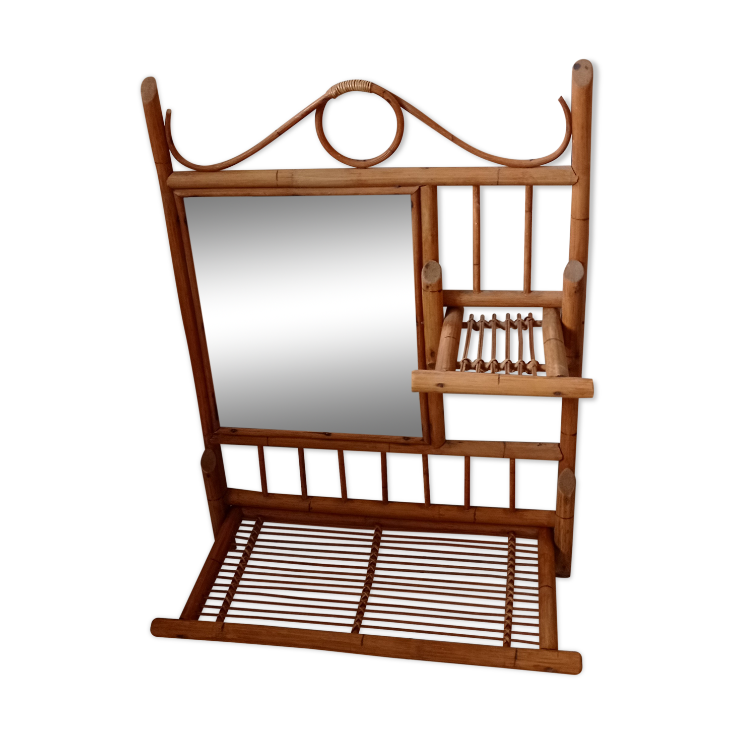 Old bamboo and rattan mirror with vintage folding shelves