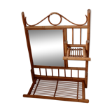 Old bamboo and rattan mirror with vintage folding shelves