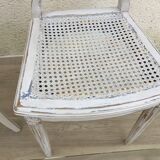 Pair of old white canne chairs