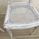 Pair of old white canne chairs