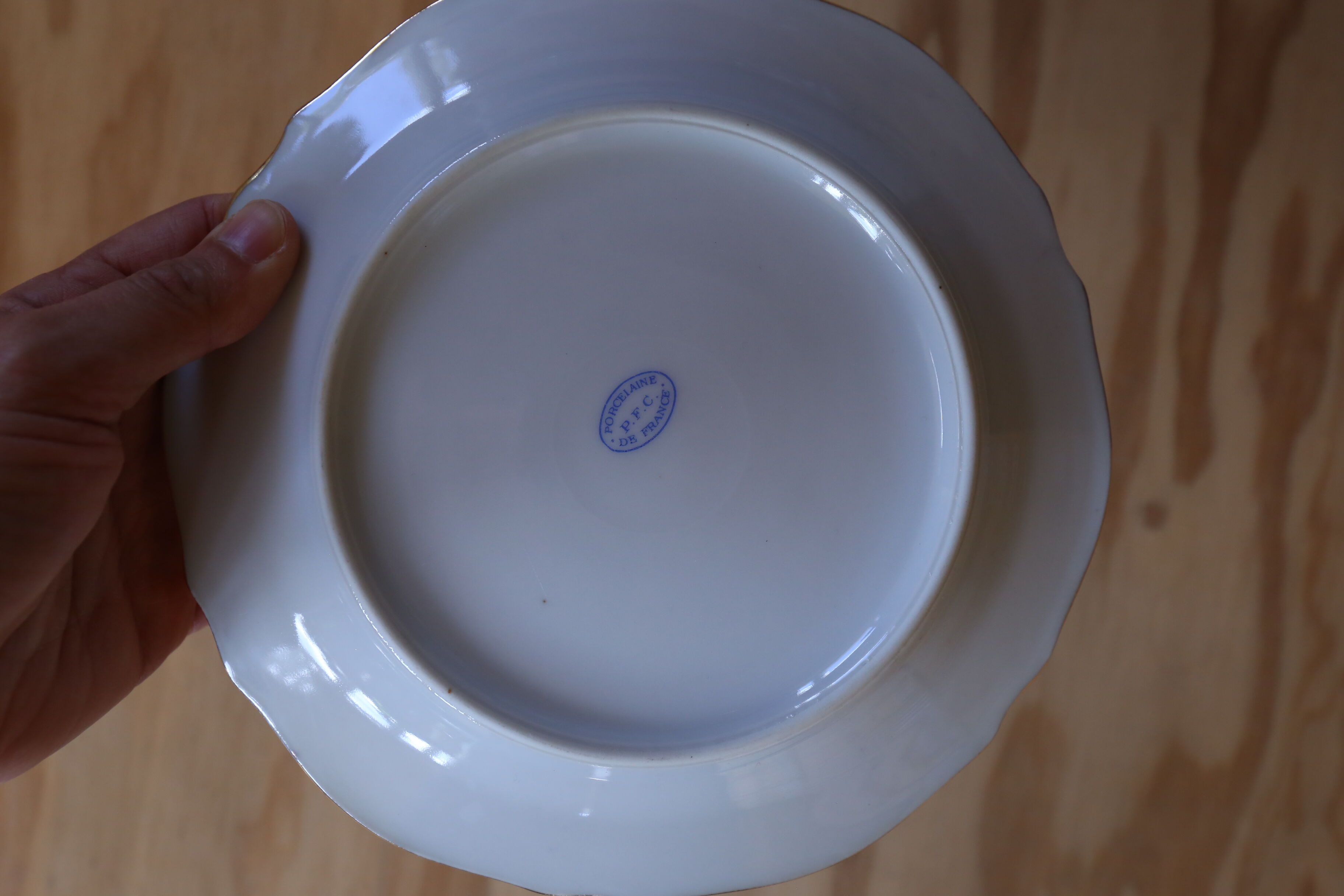 4 small vintage floral plates made of French porcelain