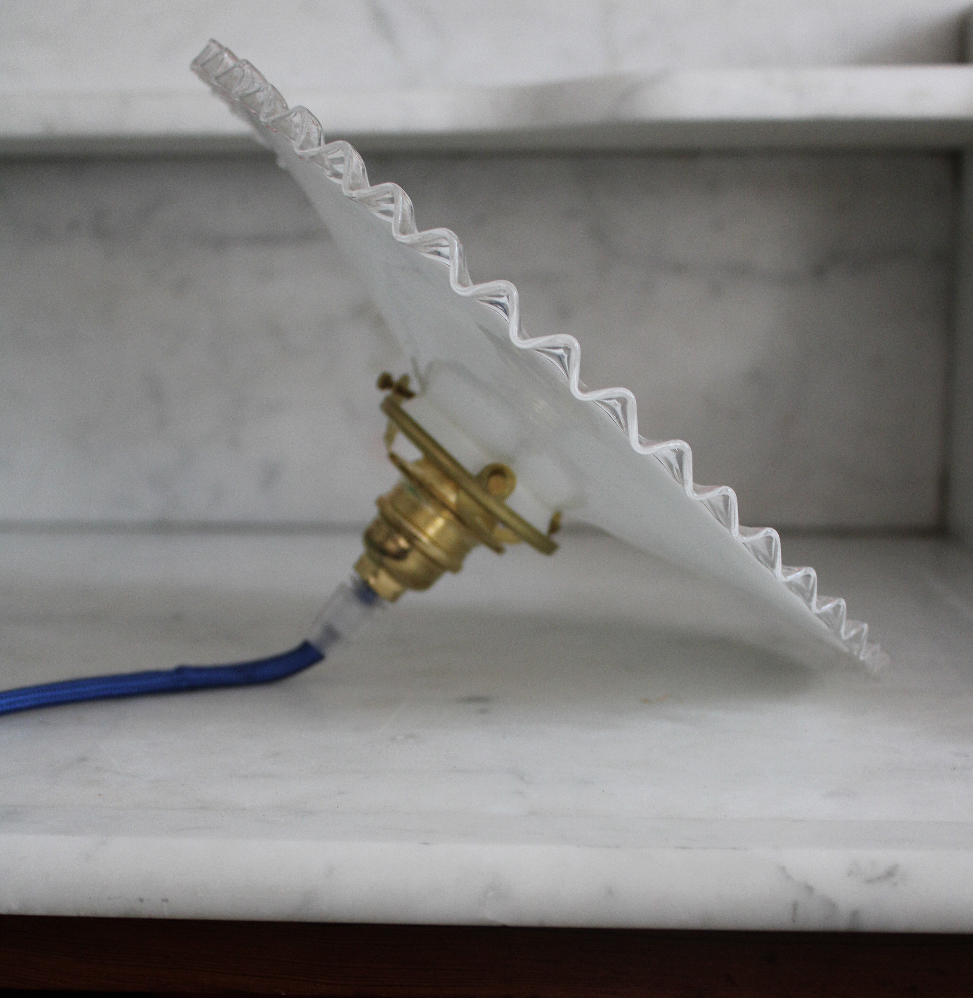 Dented opaline suspension