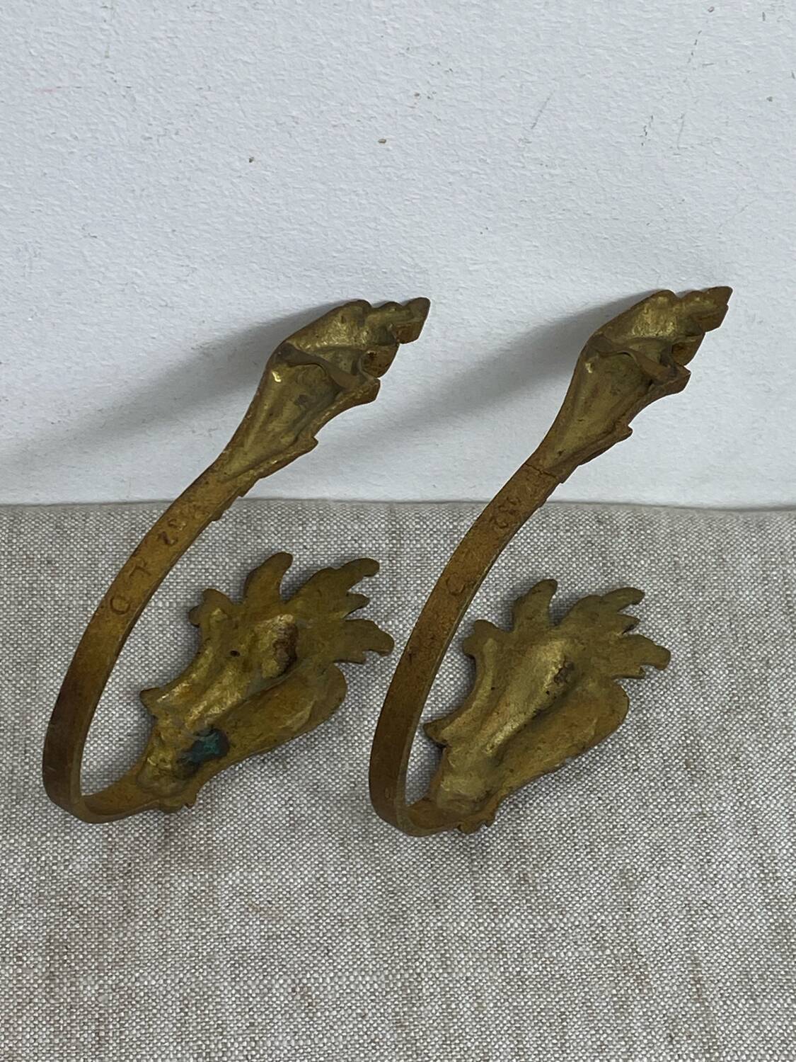 Bronze coat hooks