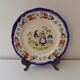 Plate of Breton earthenware of regional art KG France Quimper