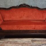 Sleeper or bench from the Charles X period in richly carved mahogany.