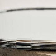 Framed metal mirror