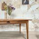 Vintage farmhouse table with spindle legs.