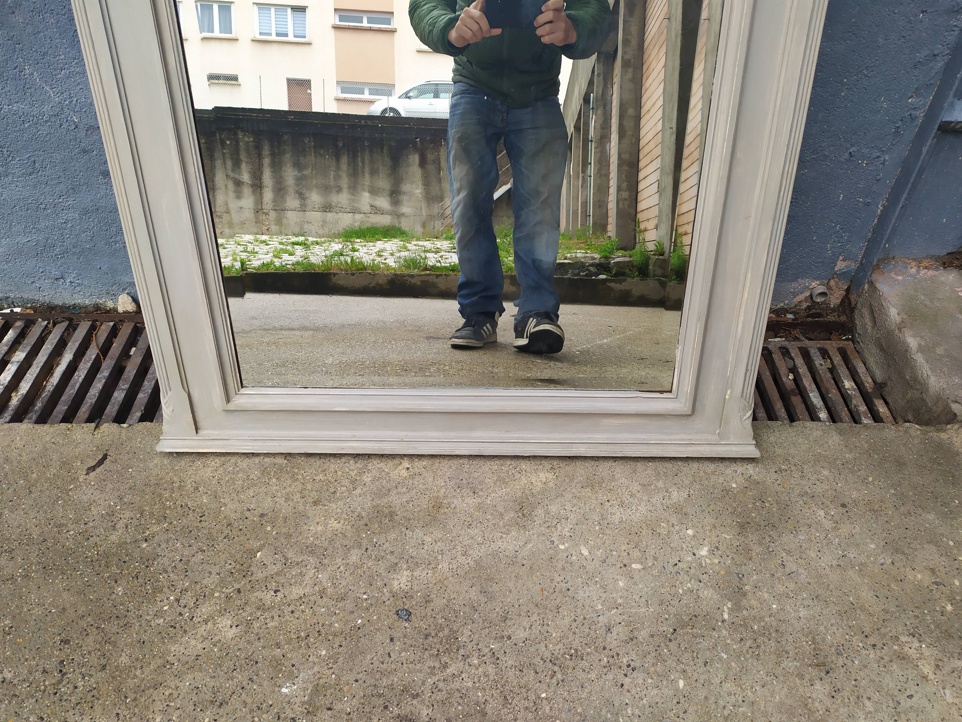 Old grey patinated mirror