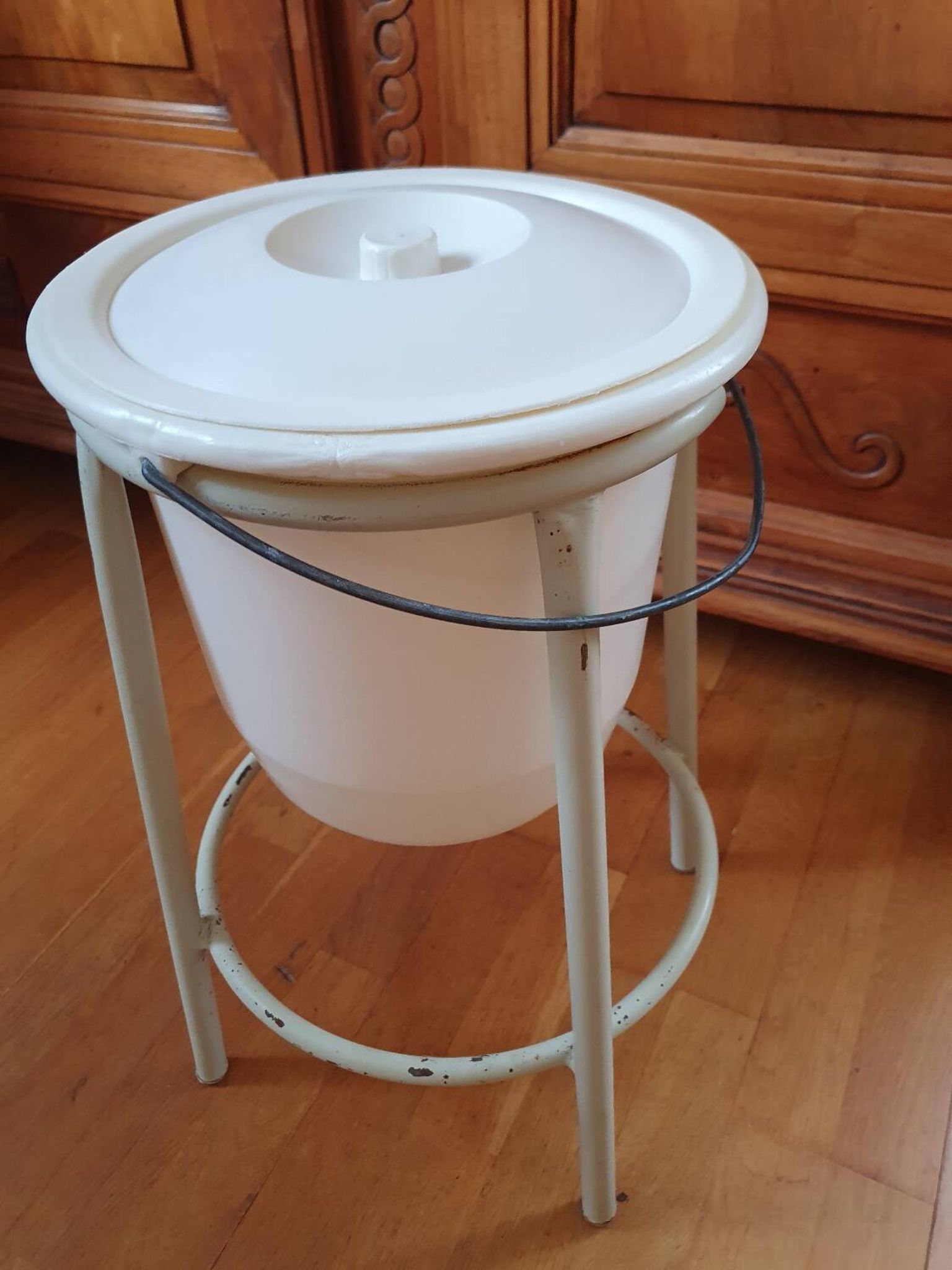 Trash can on vintage industrial style metal base
