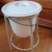 Trash can on vintage industrial style metal base