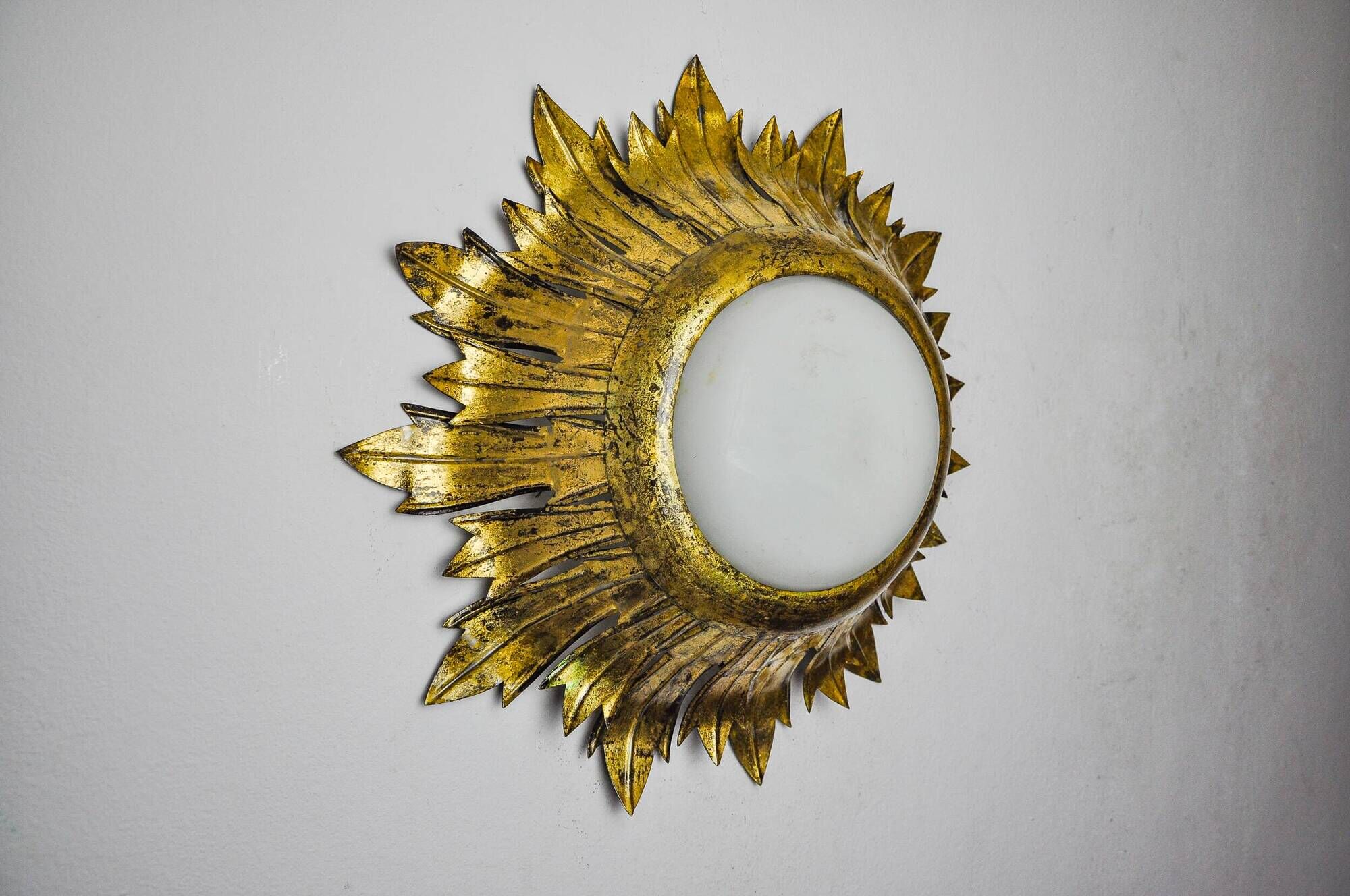 Sun wall lamp by ferro arte, metal and gold leaf, Spain, 1960