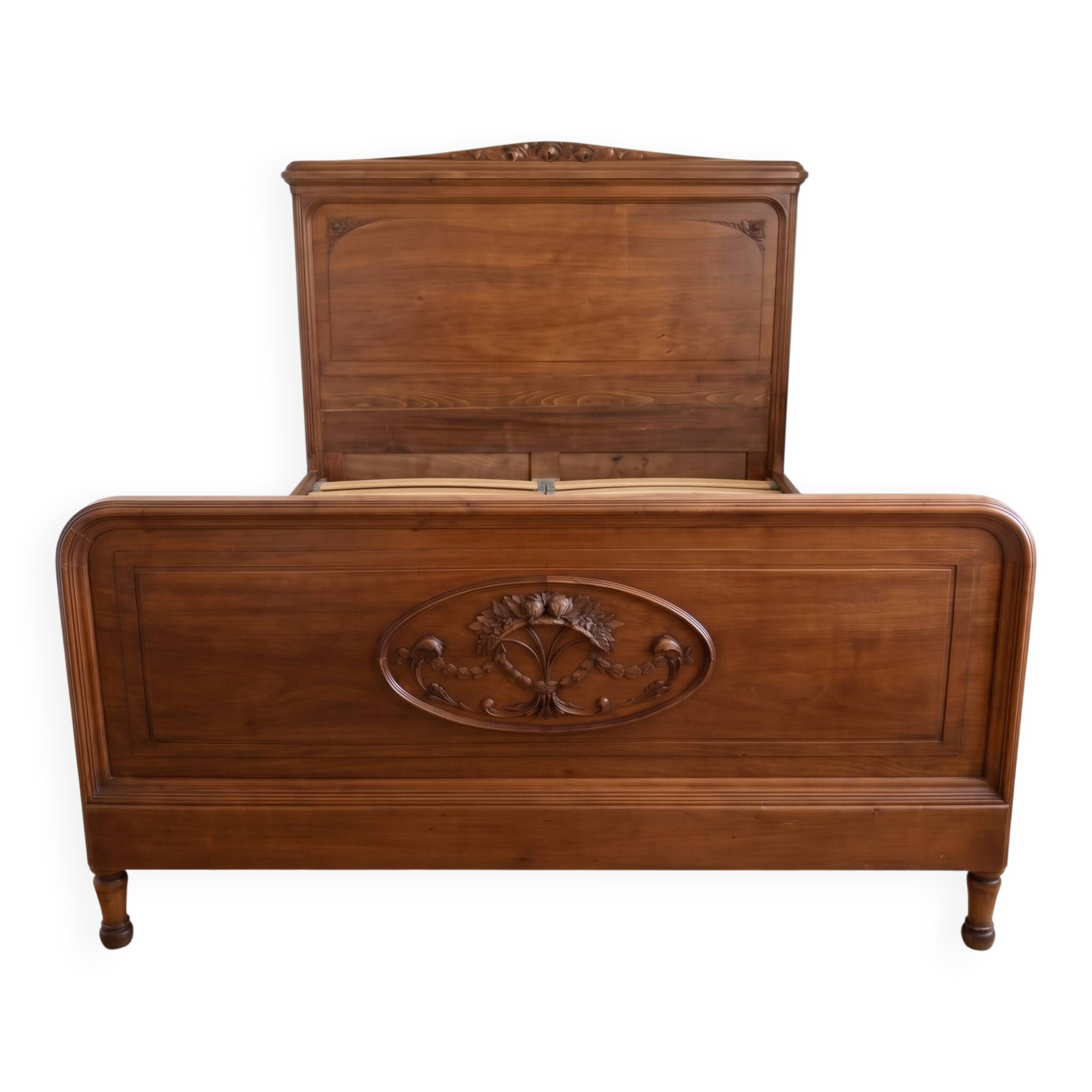 Antique carved wooden double bed