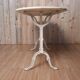 Bistro table with marble tray and wrought iron feet