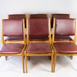 Suite of six chairs in oak and leather