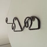 Vintage wrought iron wall coat rack