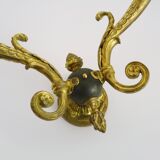 Paire d'appliques murales style Empire double feux en bronze
