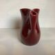 Old burgundy pitcher