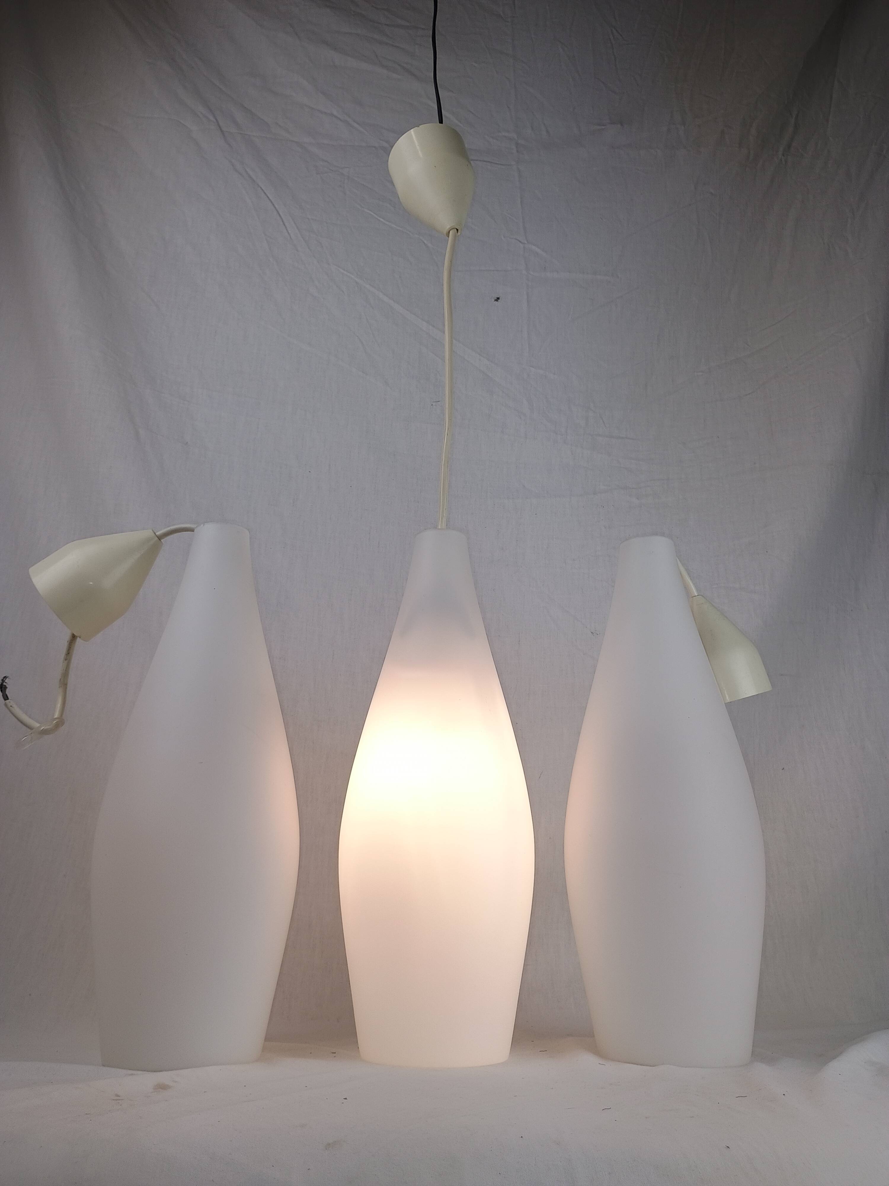 Superb set of three Holmegaard white opaline glass pendant lights