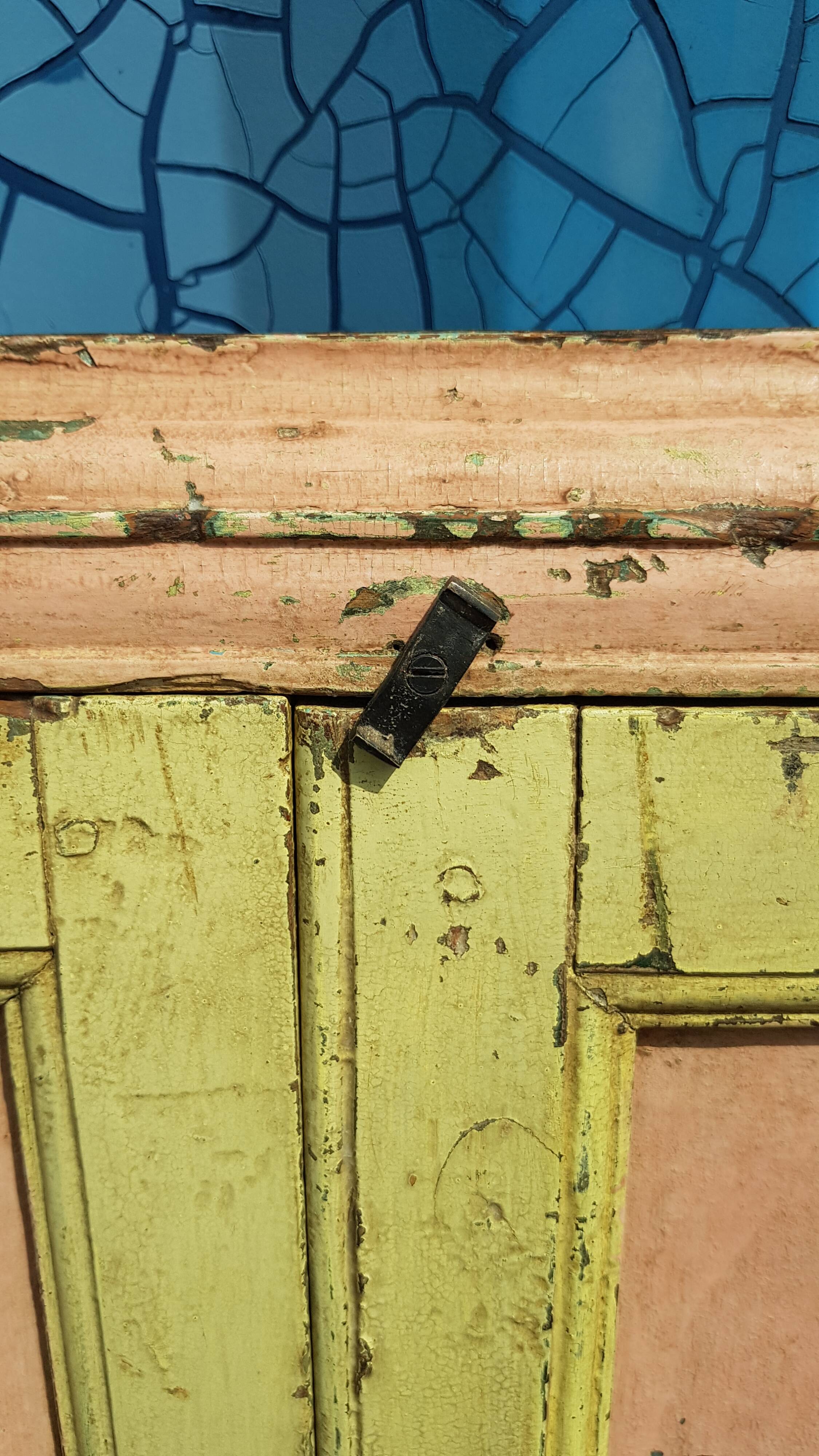 Old polychrome Burmese teak window with interior mirror.