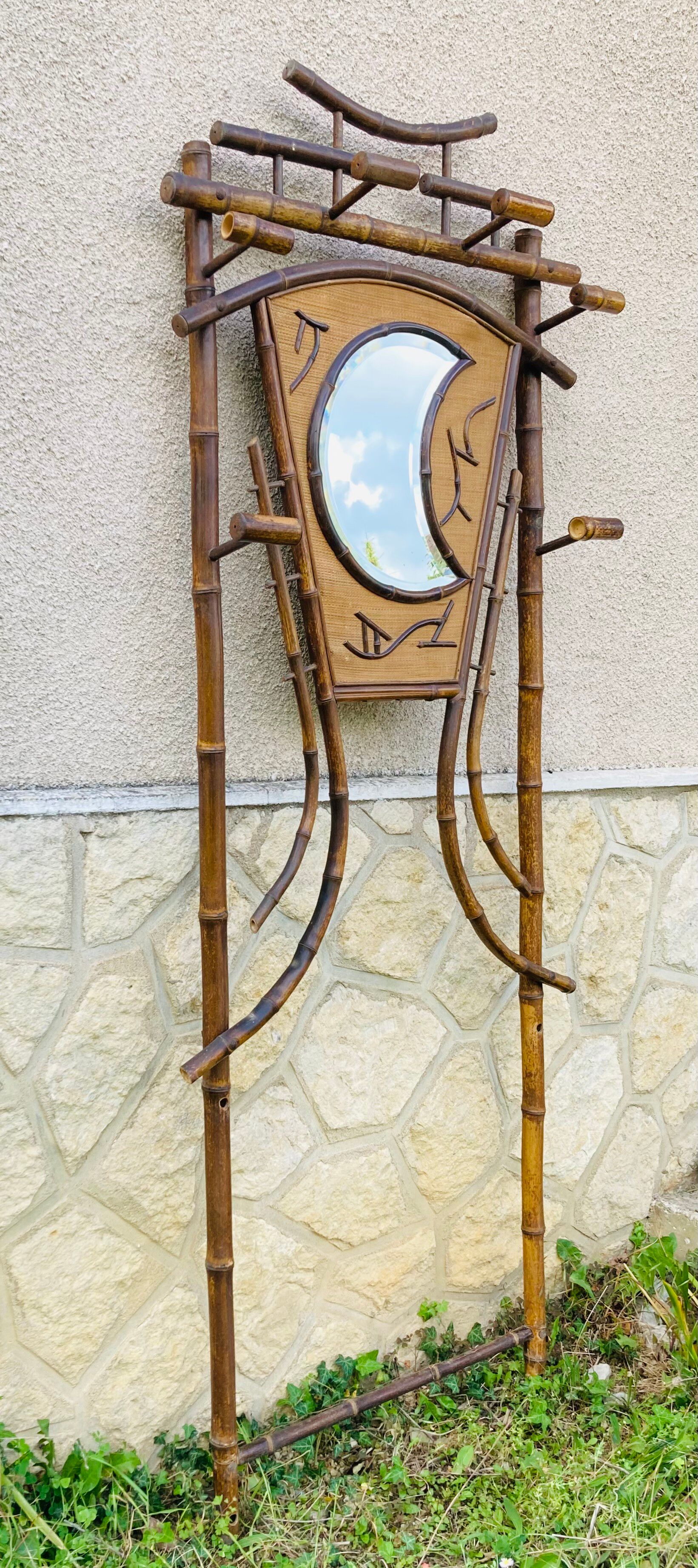 Bamboo coat rack from the 19th century, mirror in the shape of a crescent moon.