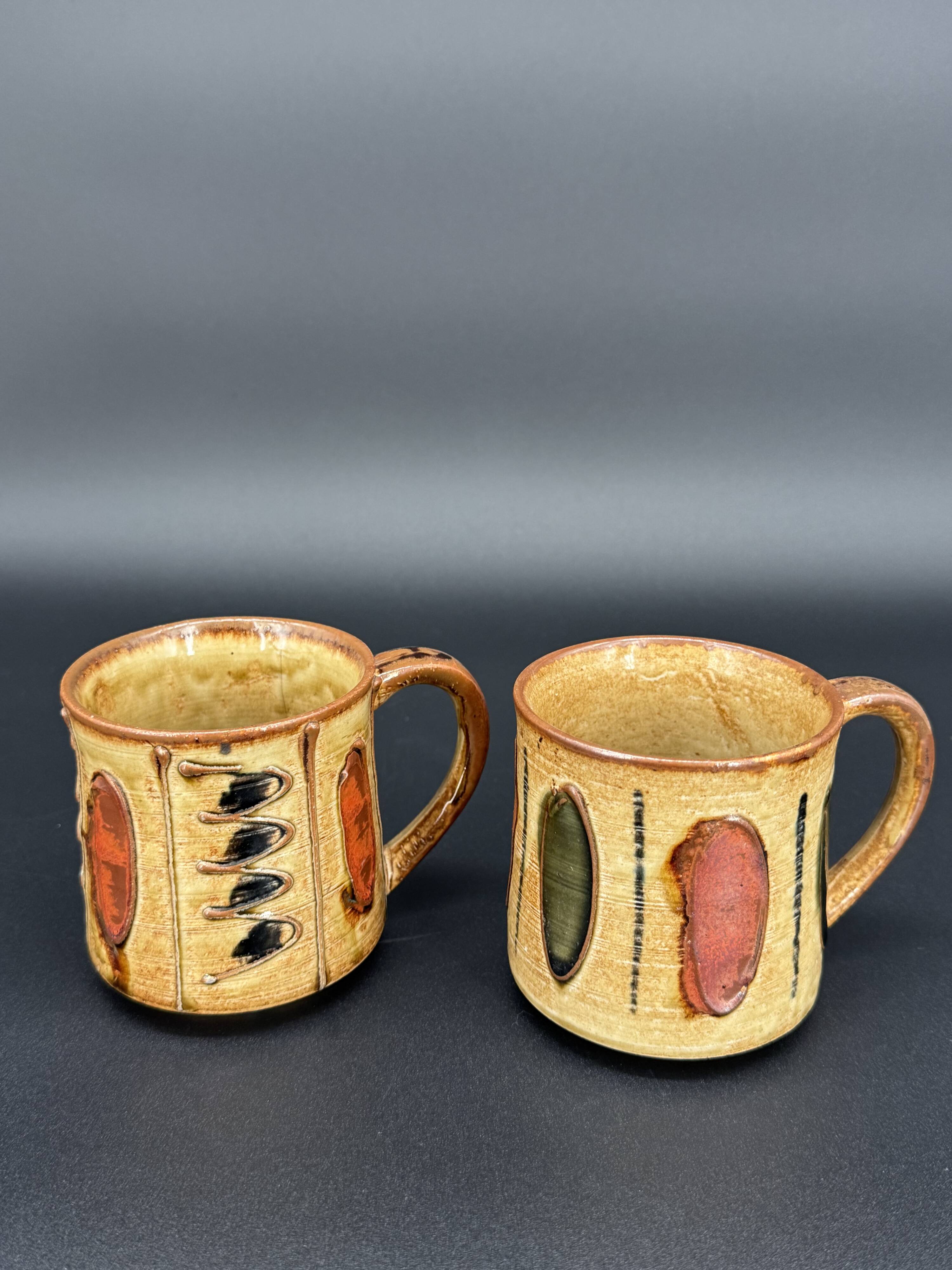 Pair of glazed stoneware mugs — abstract decor from the 70s