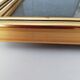 Photo frame under glass, gilded wood
