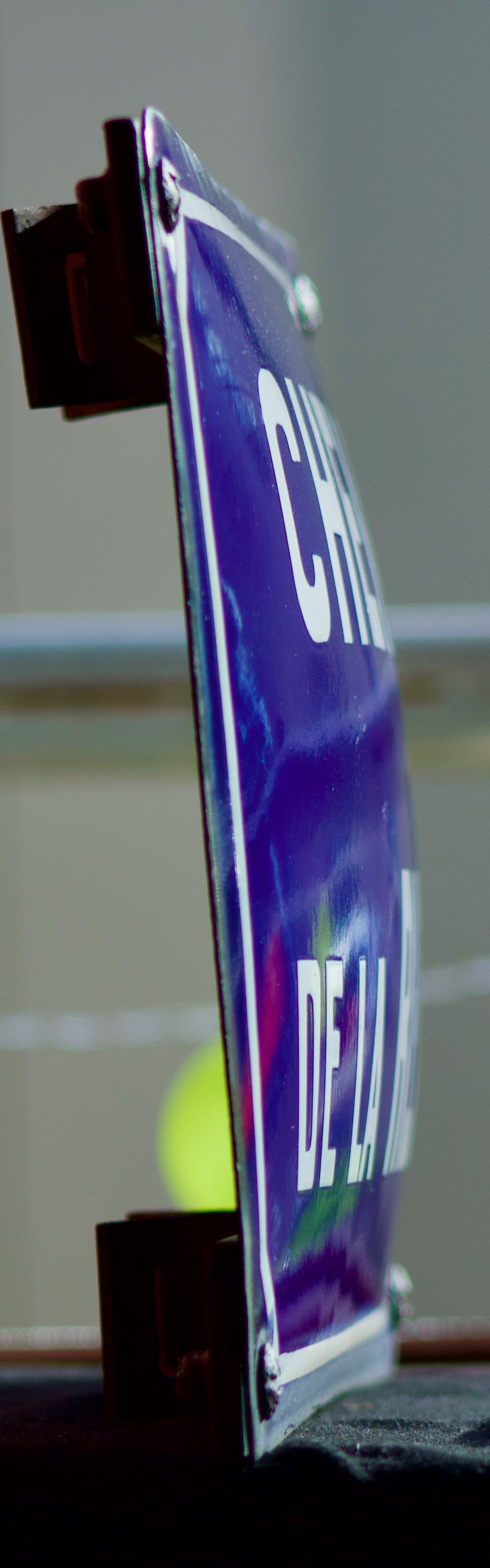 Old Enamelled and bulging "Chemin de la Rente" street plate, in perfect condition, on its cast iron support