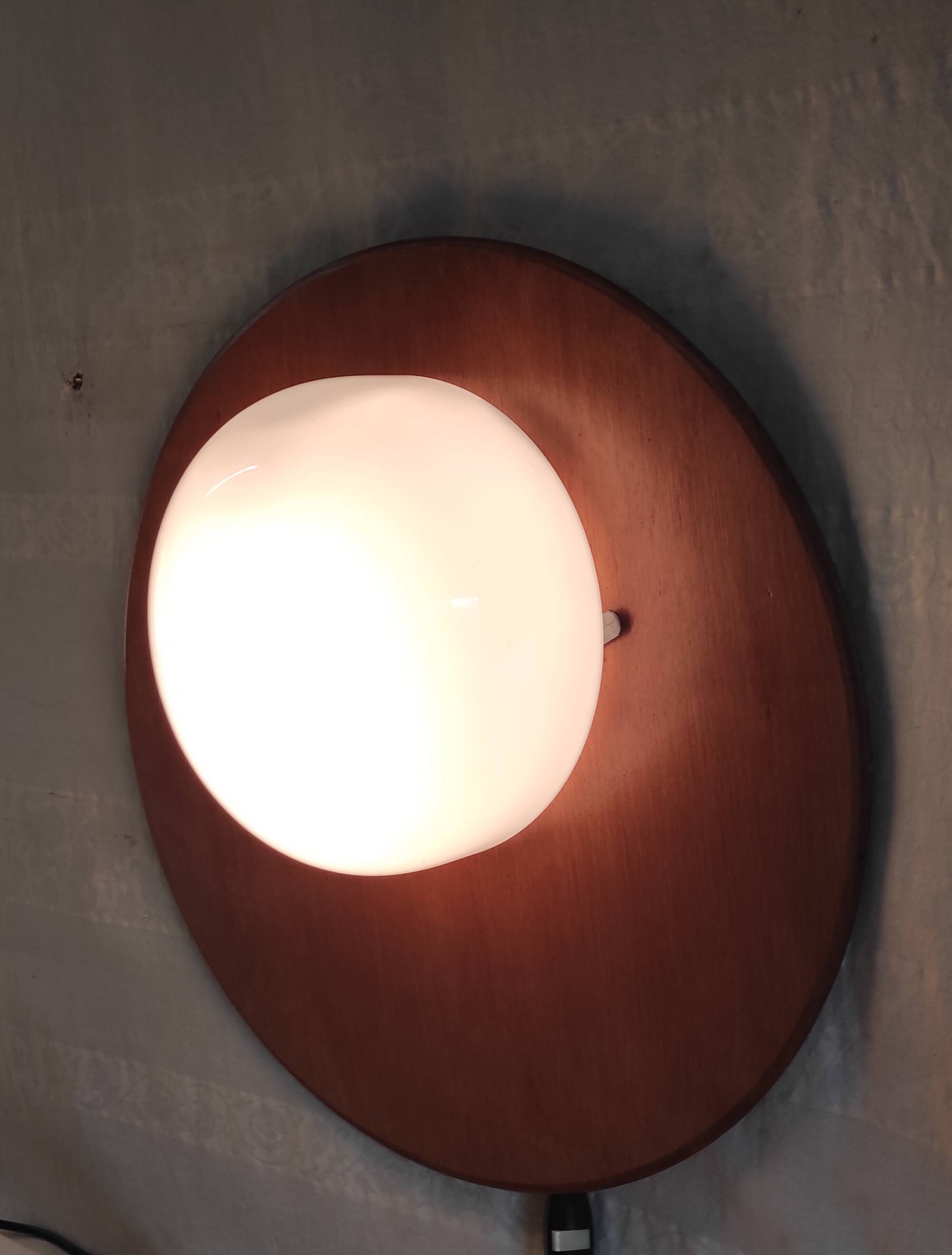 Globe-shaped wall sconces in opaline glass and wood - mid-20th century