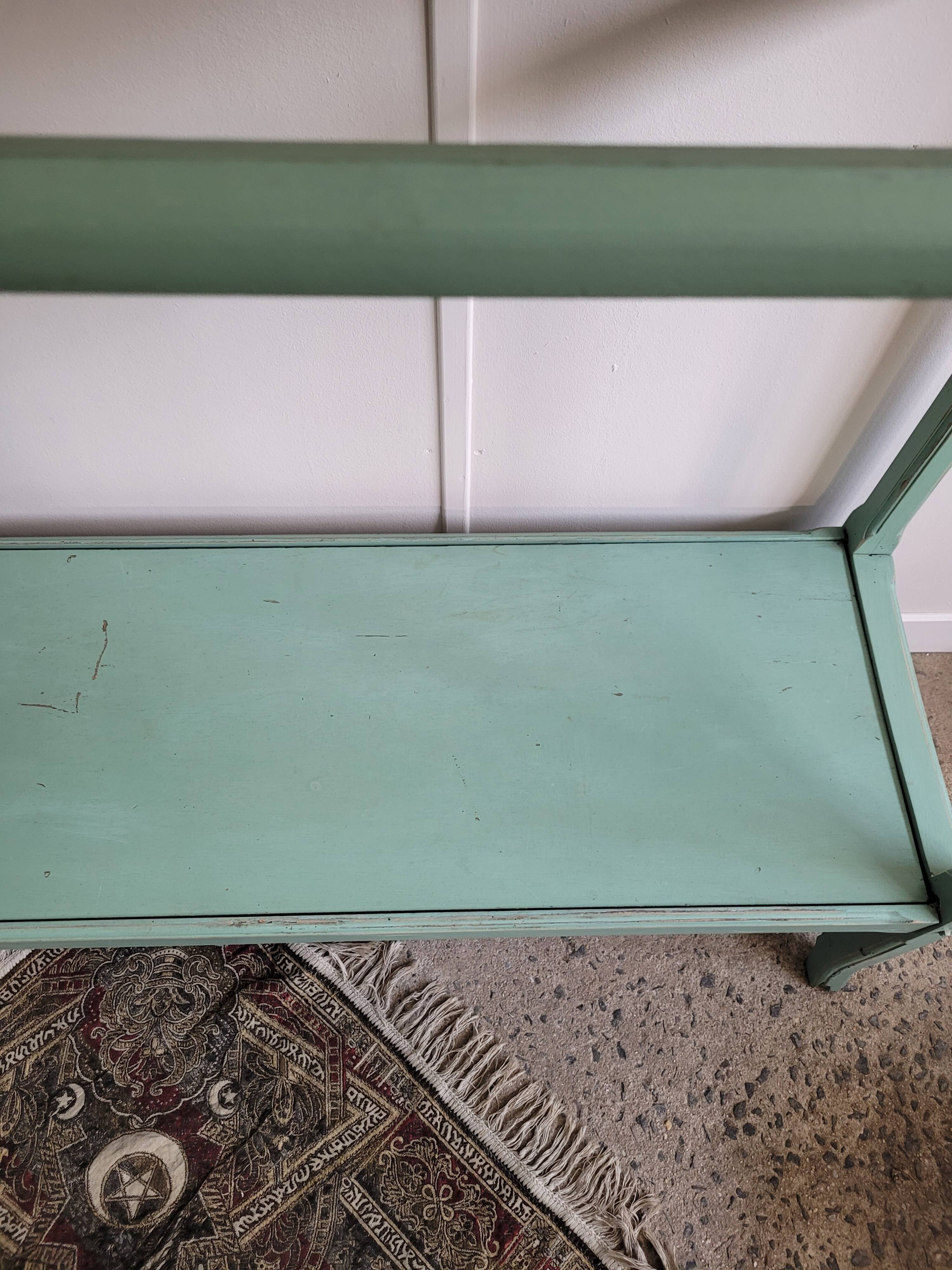 Entrance wardrobe saying "Throw clothes"