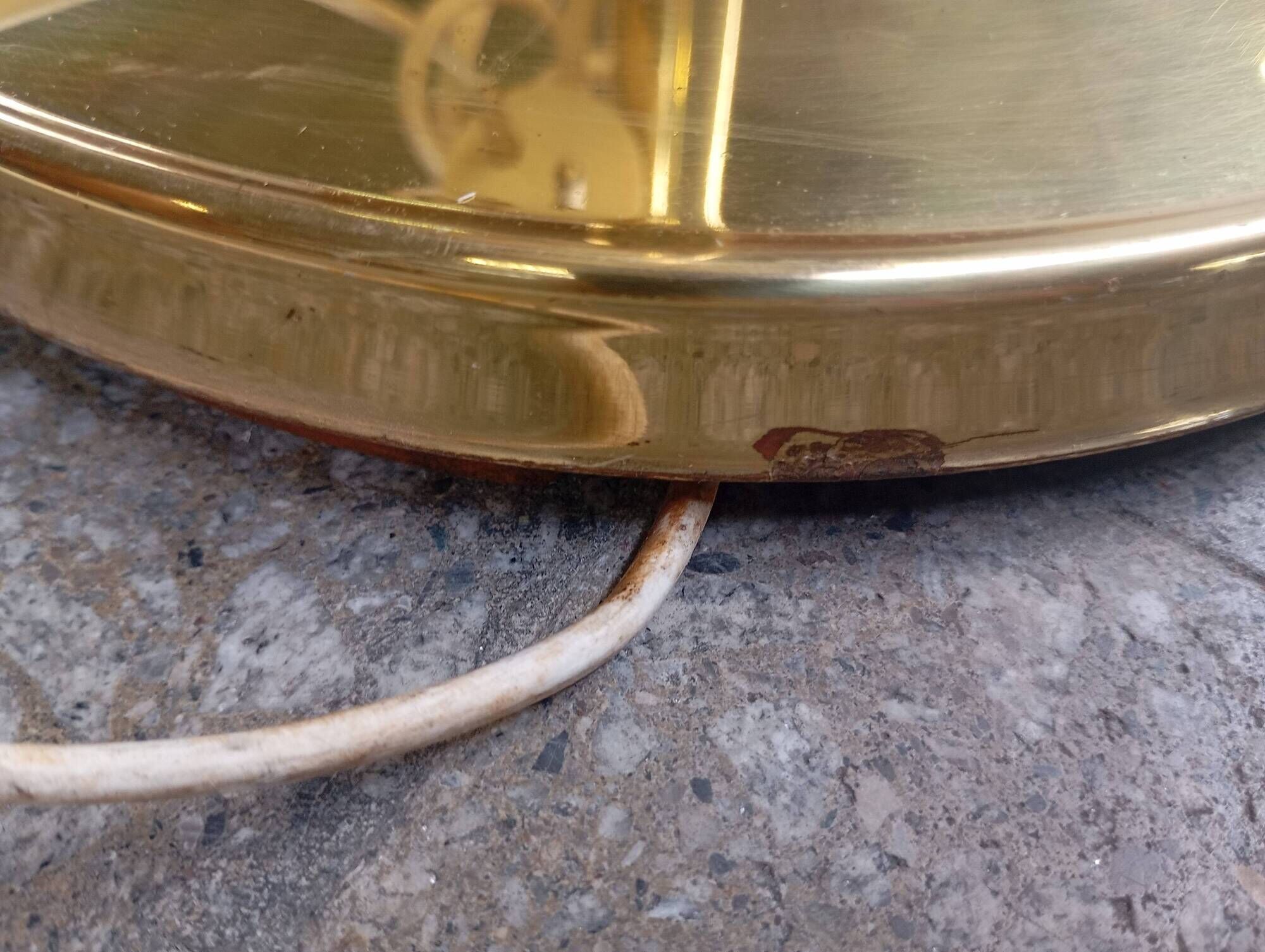 Vintage floor lamp with a gold base.