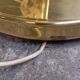 Vintage floor lamp with a gold base.