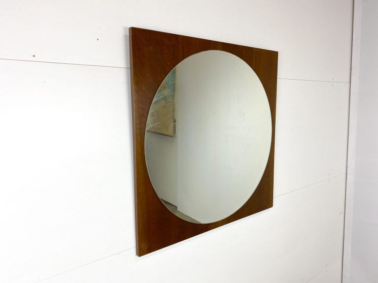 Retro mirror on wood