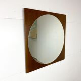Retro mirror on wood