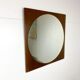 Retro mirror on wood