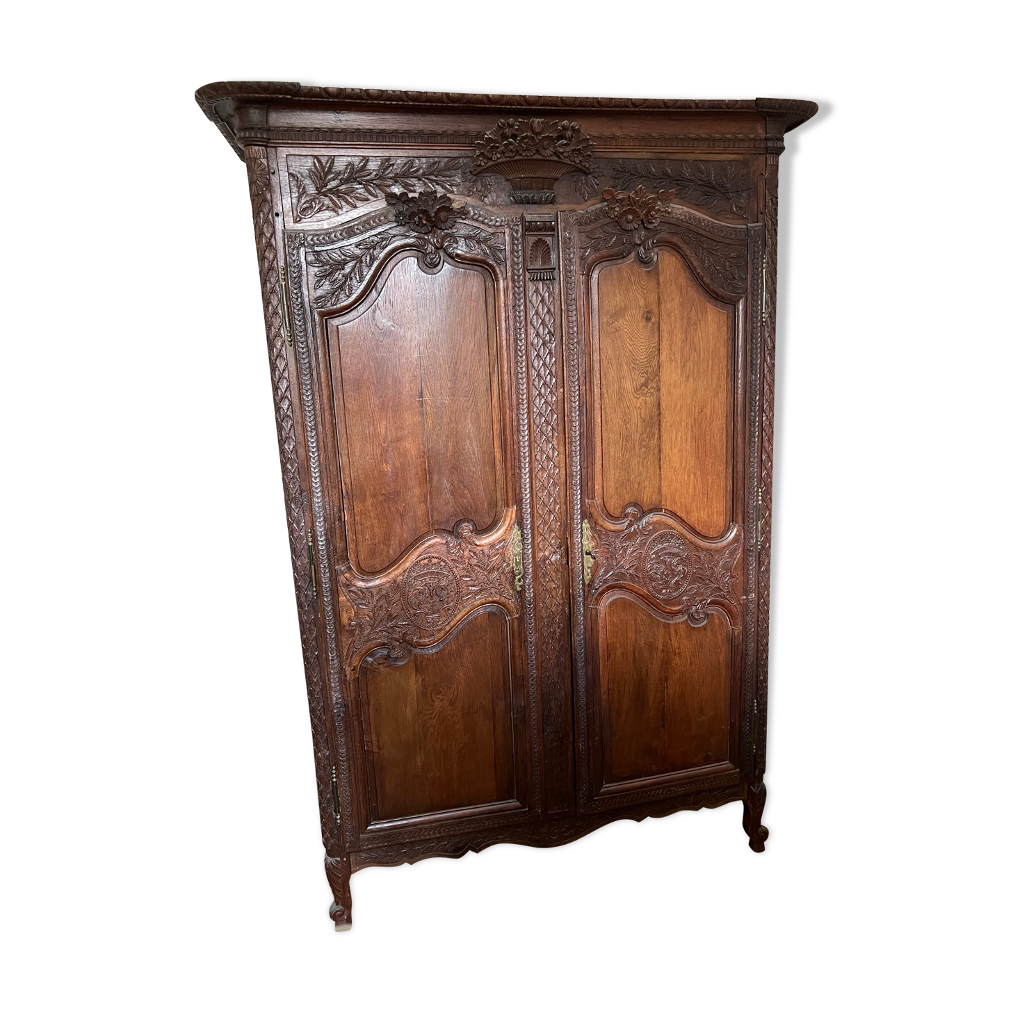 Beautiful and ancient Norman wedding wardrobe, richly carved