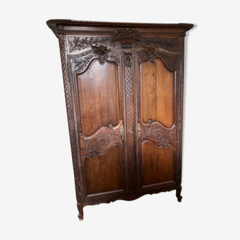 Beautiful and ancient Norman wedding wardrobe, richly carved