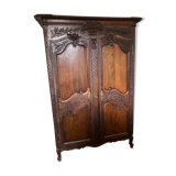 Beautiful and ancient Norman wedding wardrobe, richly carved