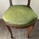 Antique wooden and velvet upholstered chair