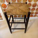 High stool made of wood and straw