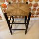 High stool made of wood and straw