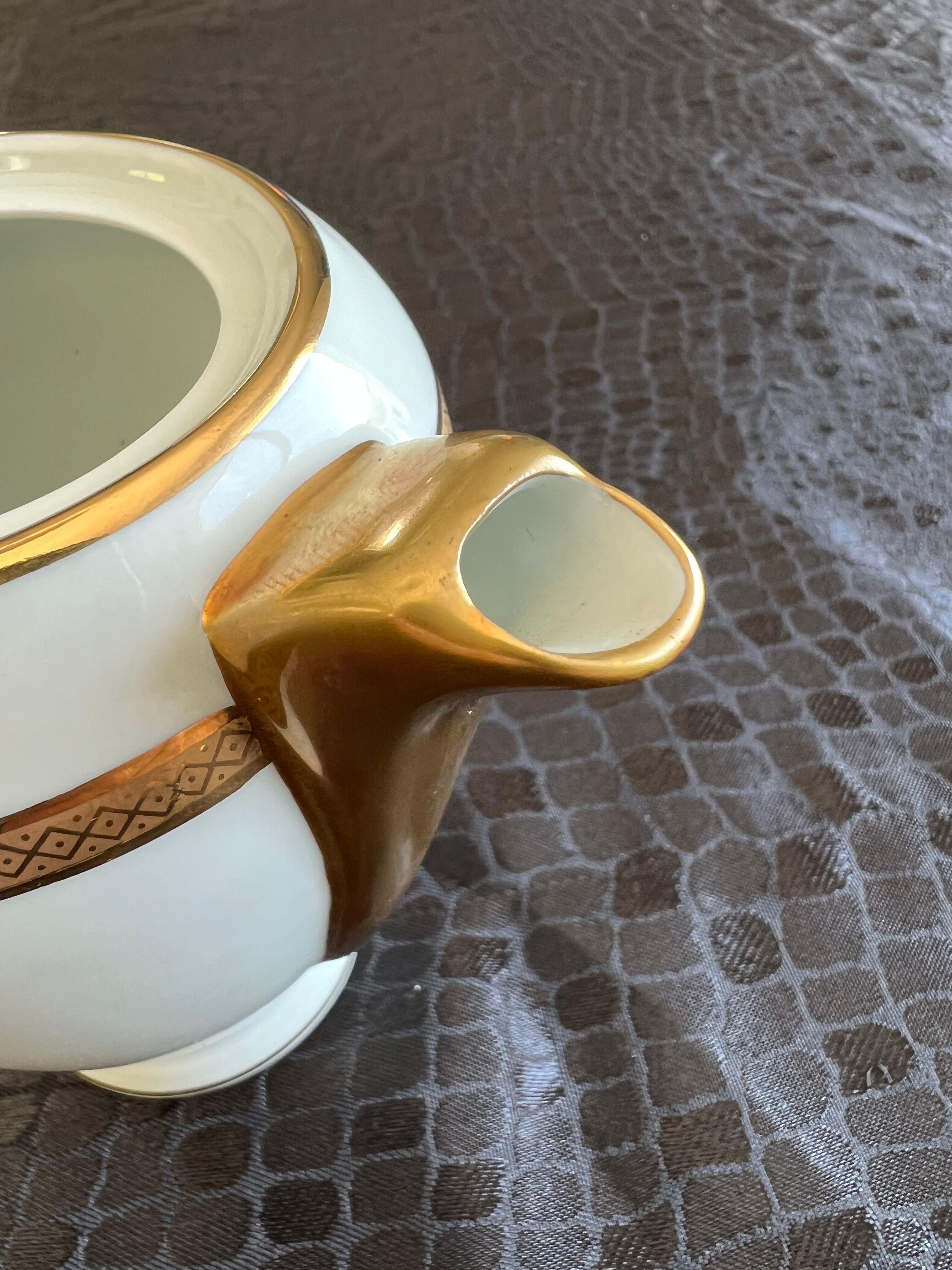 Sugar bowl, milk jug and teapot set