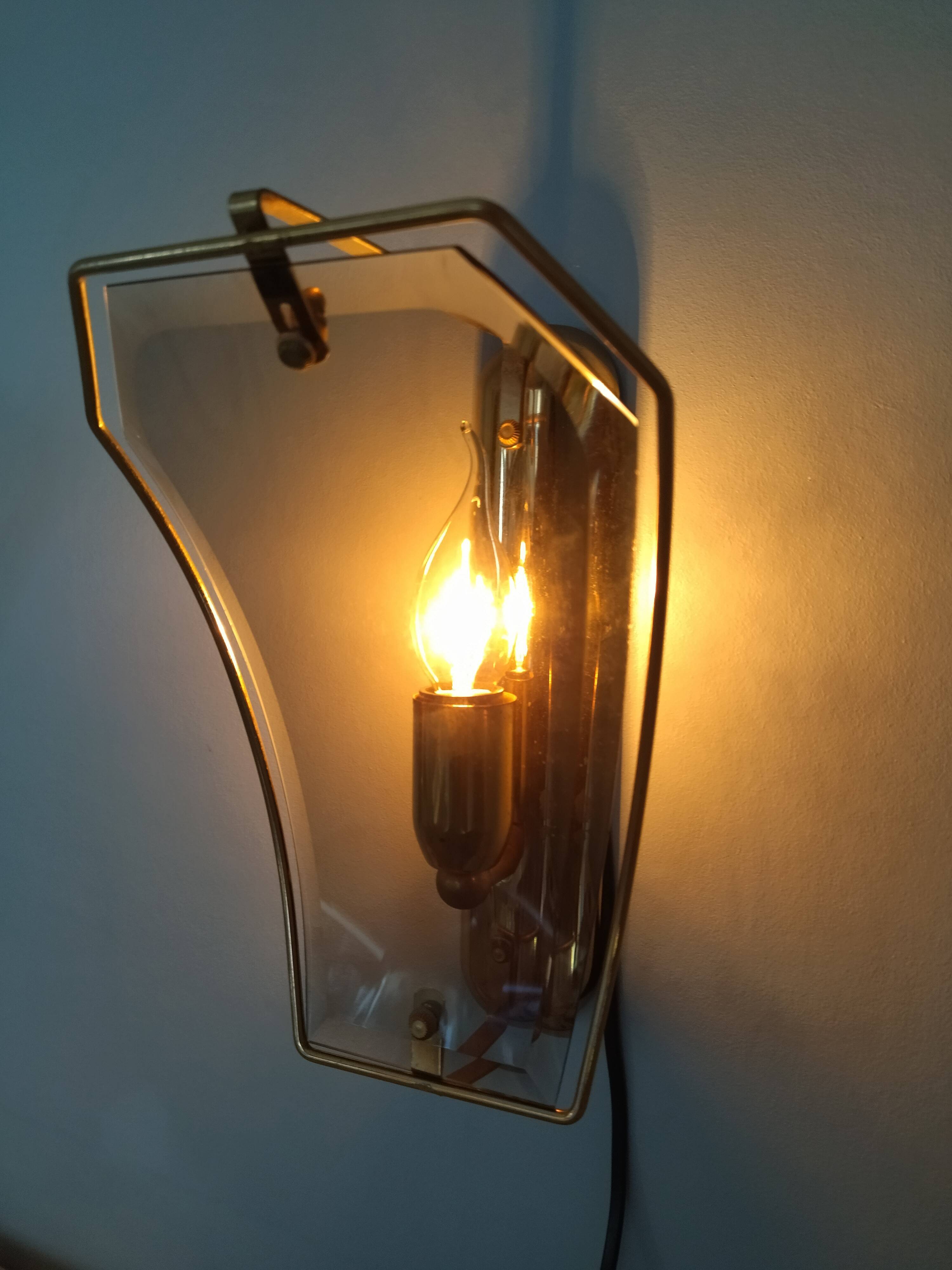 Pair of brass and curved glass wall lamps from the 80s