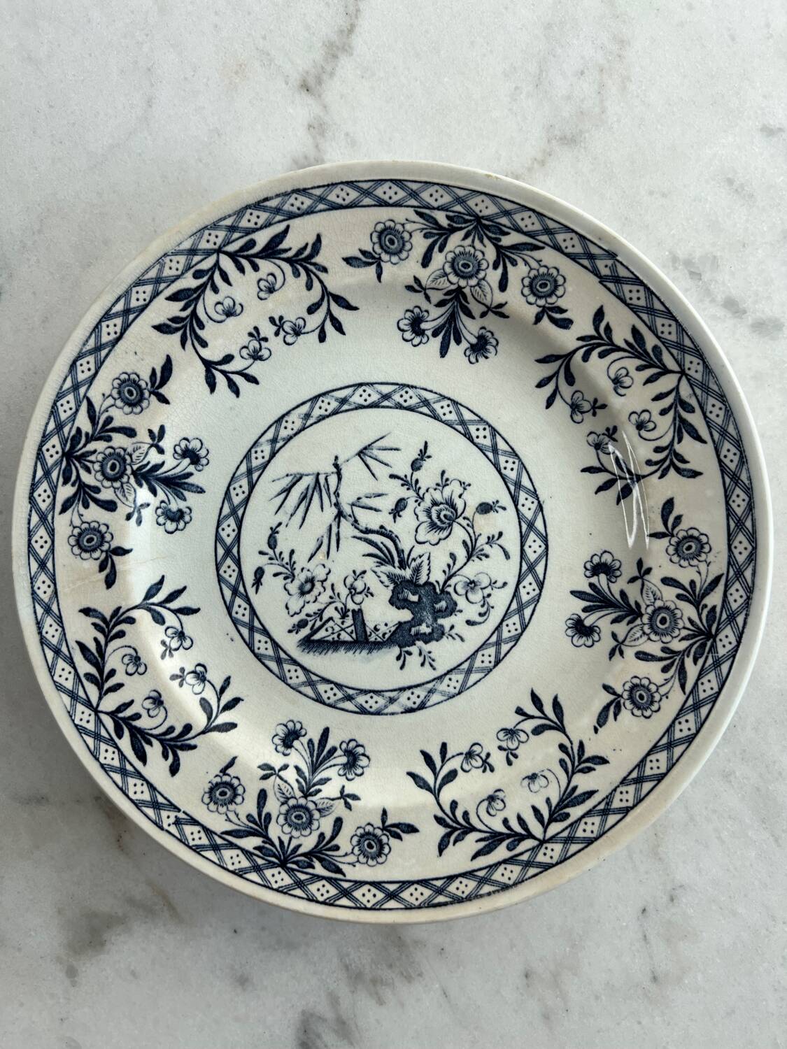 Set of five Lunéville KG Delet dessert plates.