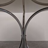 Chrome metal and smoked glass round table, Italy circa 1970.