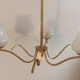 Vintage gold 3-light chandelier and white printed glass